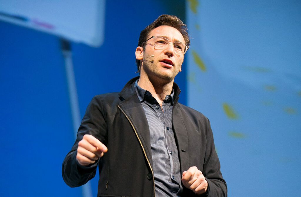 Simon Sinek speaking in a conference